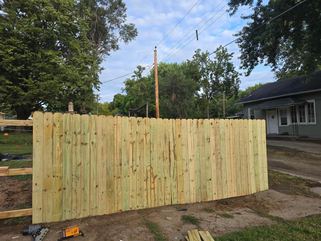 New wood privacy fence installation