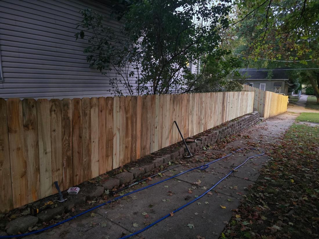 Completed wood privacy fence